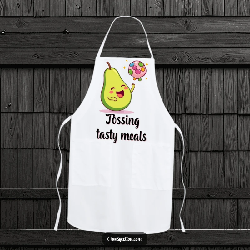 Funny apron featuring a happy avocado tossing a colorful bean bag, ideal for kitchen fun.