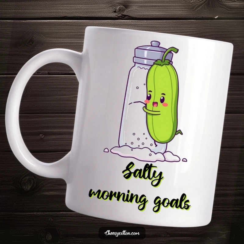 Funny mug showcasing a determined pickle character making a valiant attempt to climb a giant salt shaker, full of perseverance and humor.