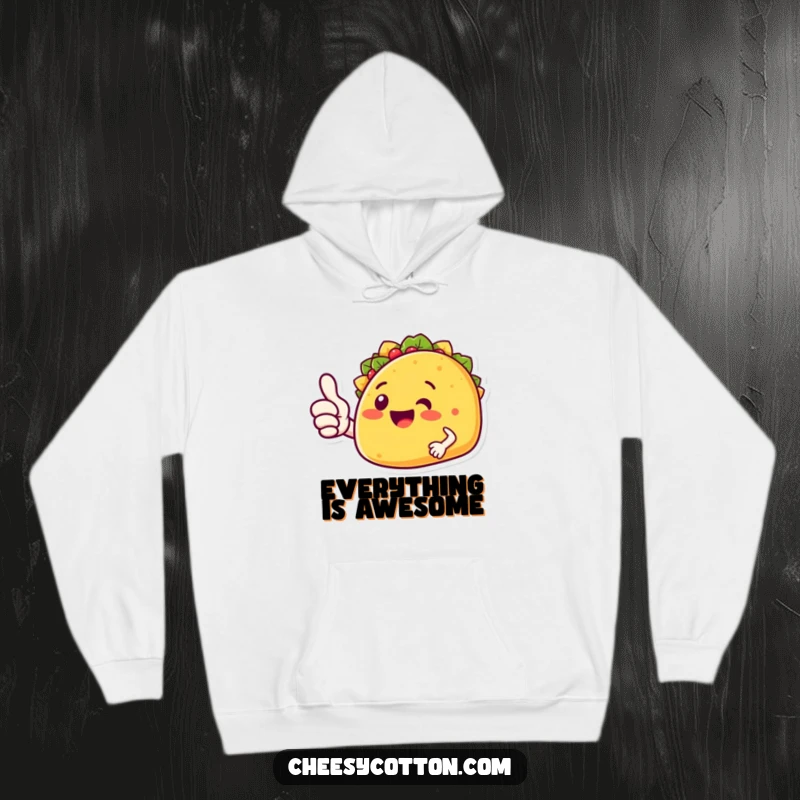 Funny taco character giving a cheerful thumbs up, featured on a comfortable hoodie for a humorous and warm feel.