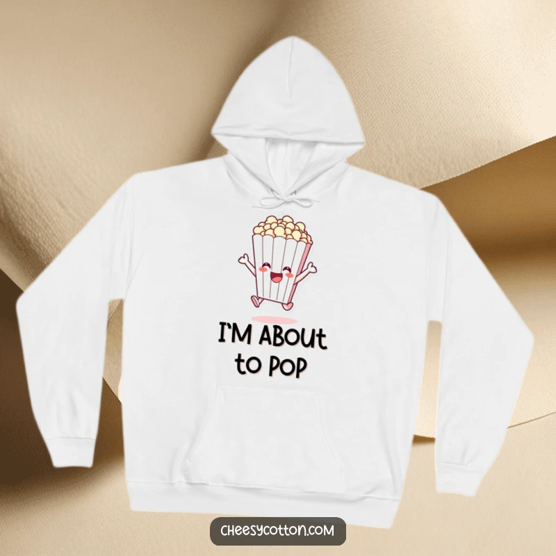 Funny hoodie showcasing a cheerful popcorn bag character excitedly leaping, perfect for cozy comfort.