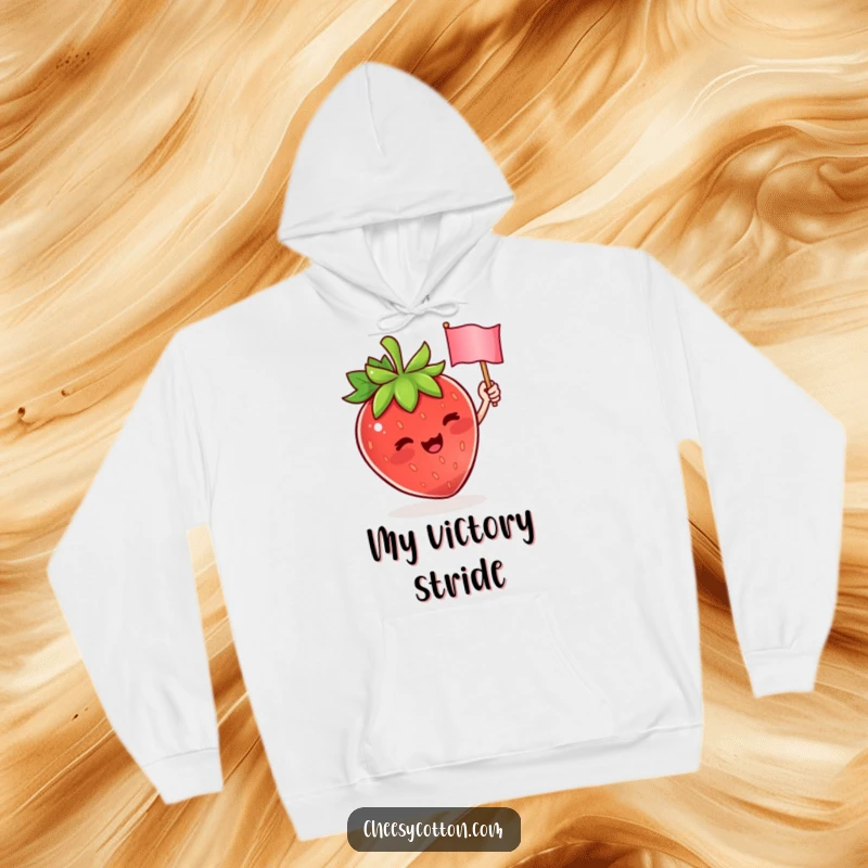 Funny hoodie showcasing a cute strawberry character enthusiastically waving a tiny flag, offering warmth and a dose of playful cheer.