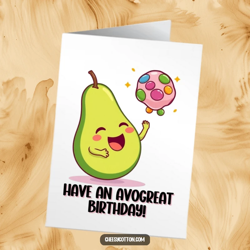 Funny Free Printable Birthday Card: A happy avocado joyfully tosses a colorful bean bag, celebrating a birthday.