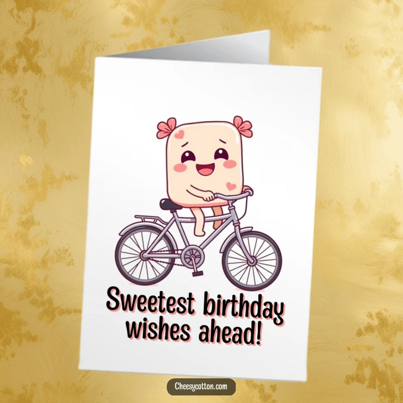 Funny Free Printable Birthday Card: A giggling piece of candy comically riding a tiny bicycle, spreading cheer.