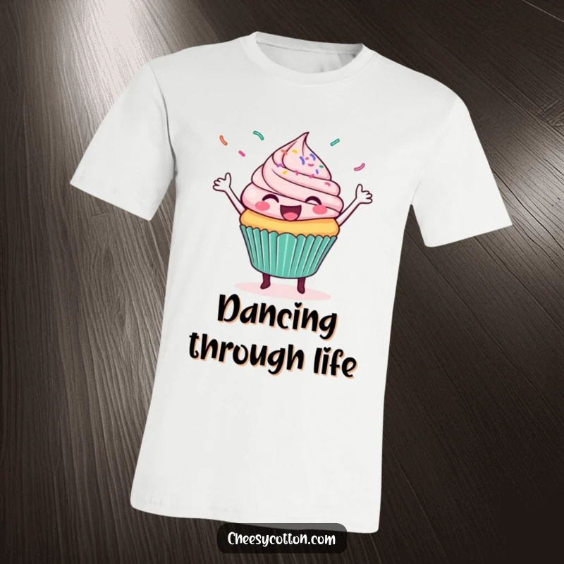 Funny t-shirt graphic of a delighted cupcake busting a move with a flurry of colorful sprinkles exploding around it.