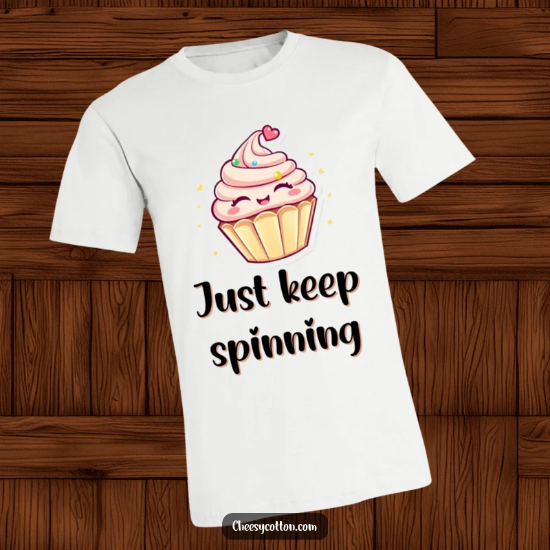Funny Kawaii Cupcake T-Shirt: A cute, round cupcake character joyfully spinning with closed eyes, embodying pure bliss on a tee.