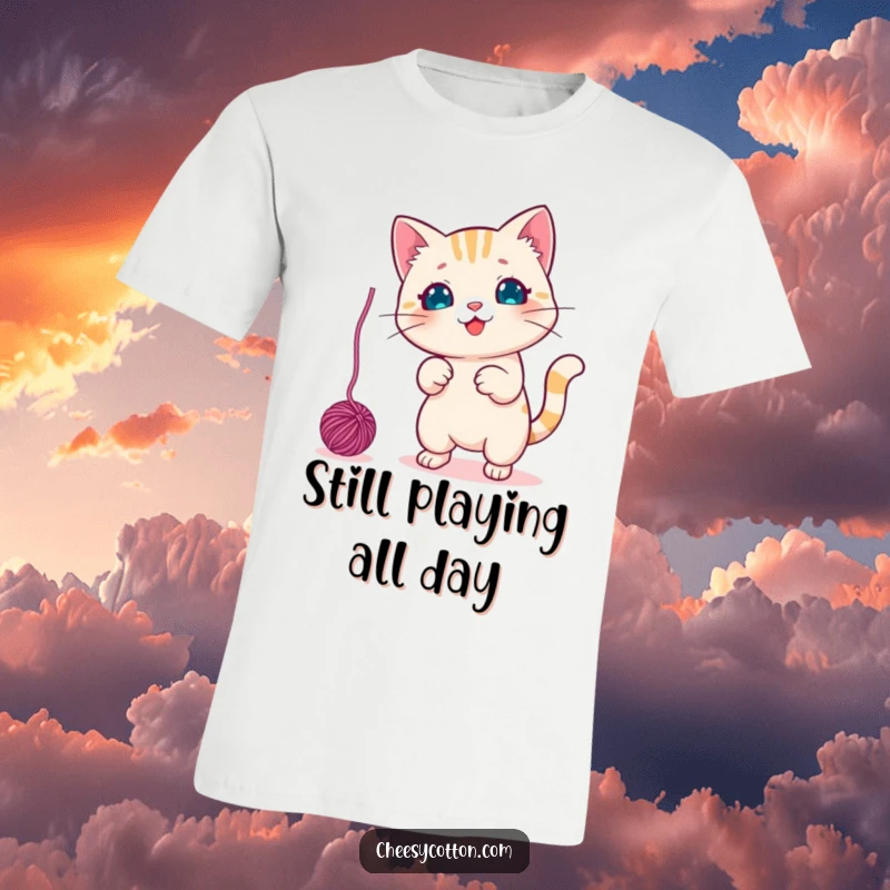 Funny T-Shirt showcasing a cute kawaii cat character energetically batting at a dangling yarn ball, full of playful action.