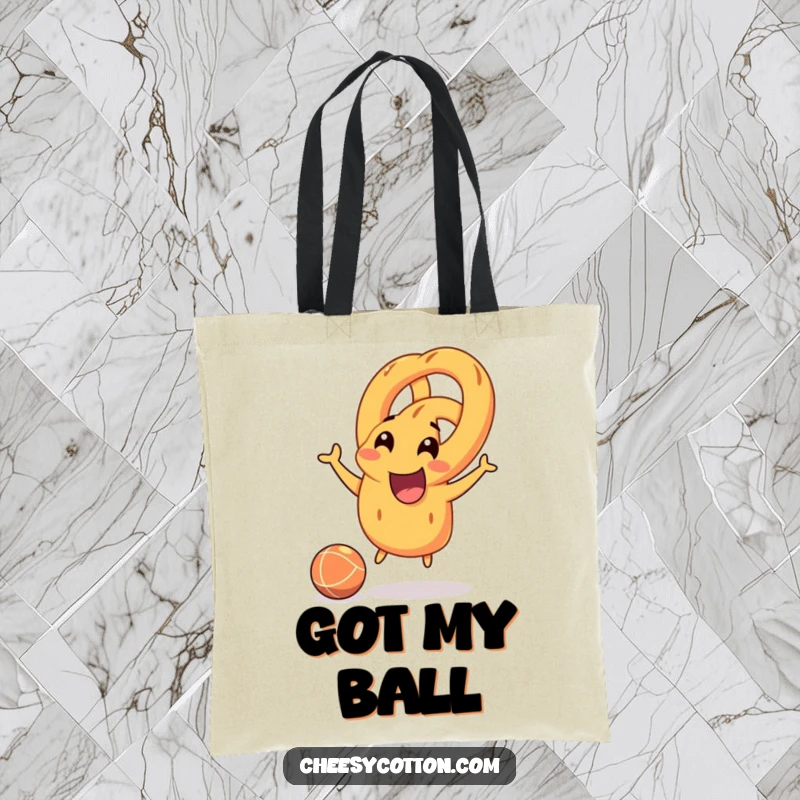 Funny smiling pretzel character joyfully bouncing a rubber ball, durable and cheerful tote bag for shopping or daily use.
