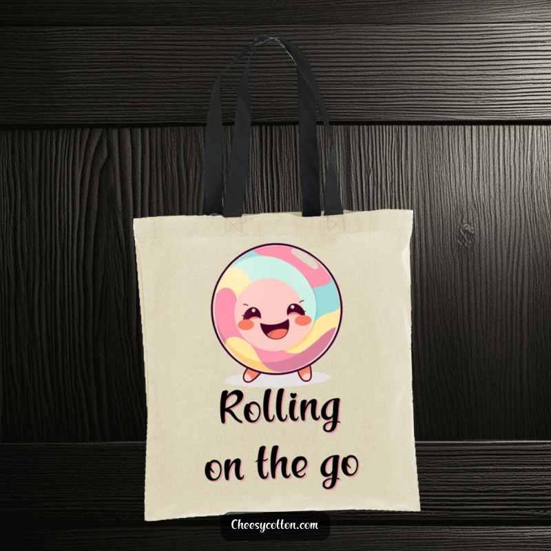 Funny Tote Bag with a happy, round candy rolling along with a big smile, perfect for carrying essentials with sweet style.